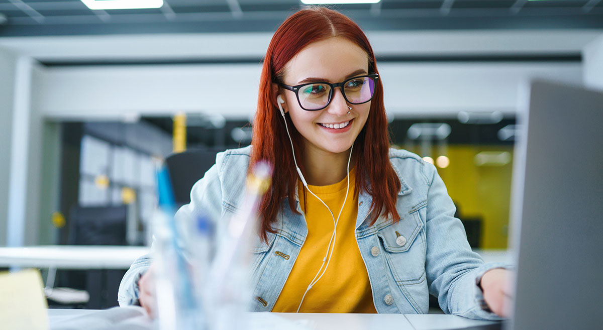 A Immanuel  intern works on her computer.