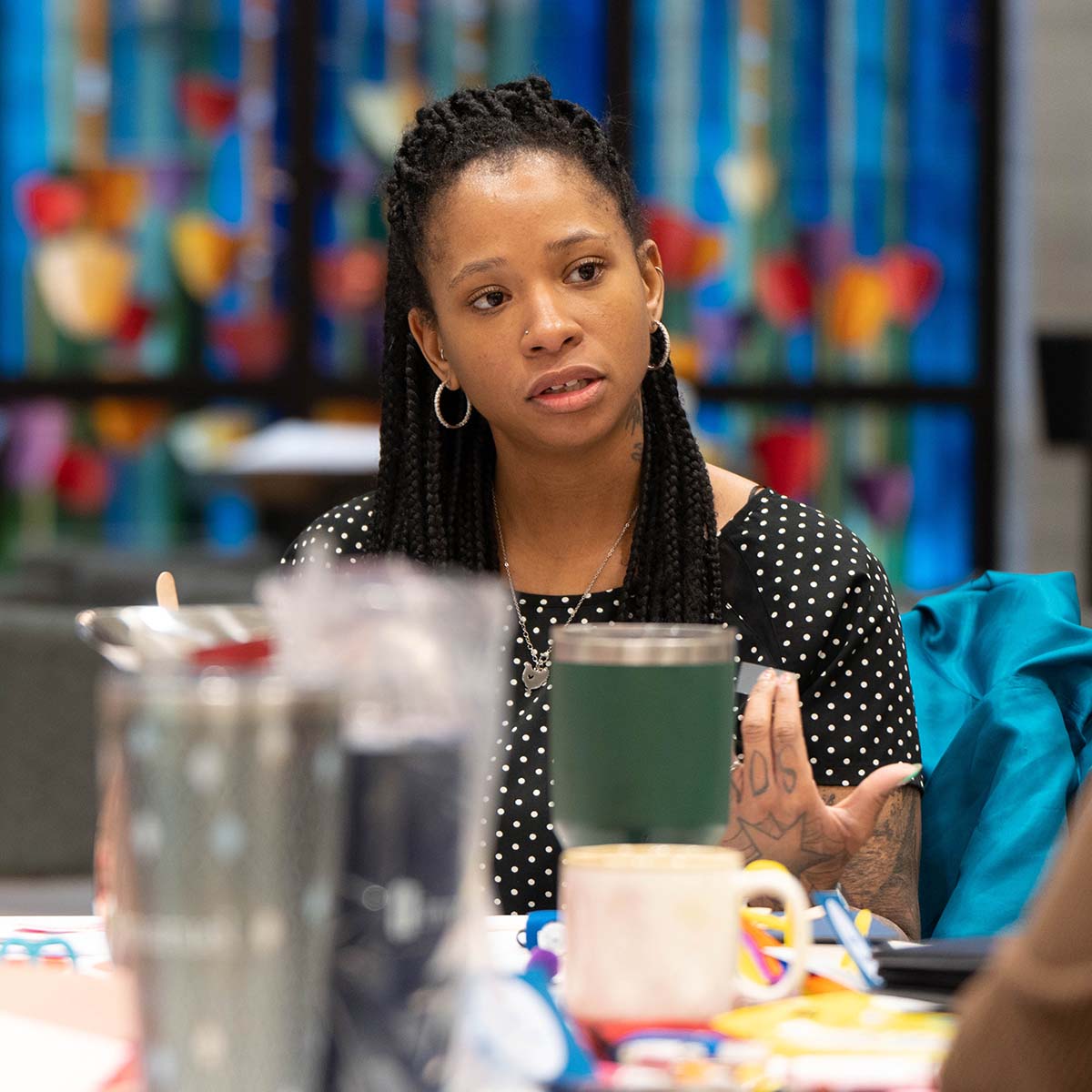 Group discussion of employees in a Leader First session.